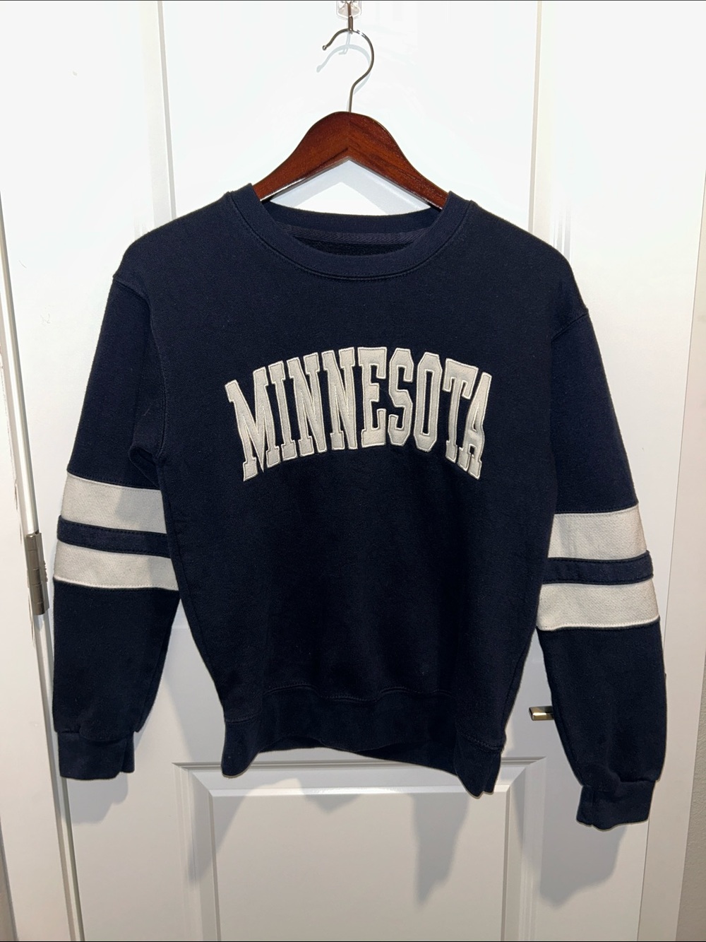 Unisex Minnesota Navy Crewneck Sweatshirt with White Sleeve Stripes